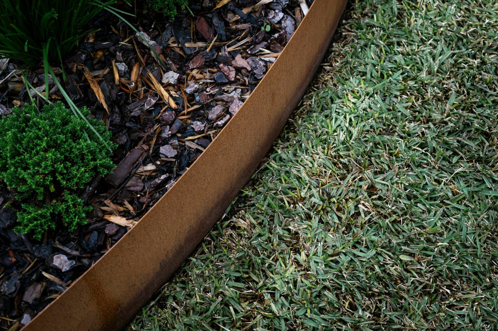 Curved corten steel edging